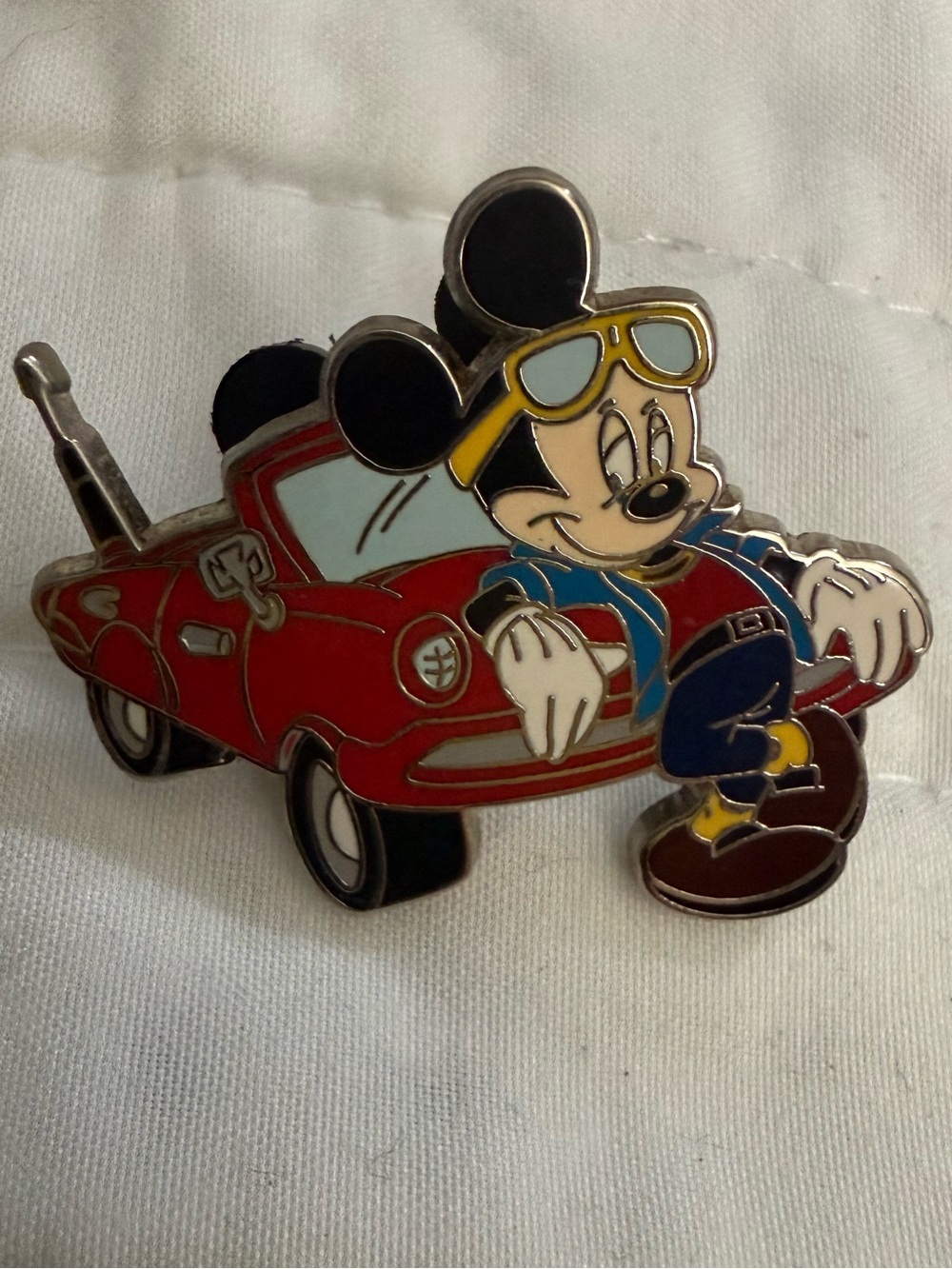 Disney Mickey Mouse and red convertible pin
